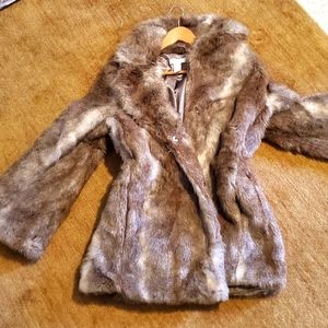 Warm and cozy Faux Fur jacket by H&M. XS size